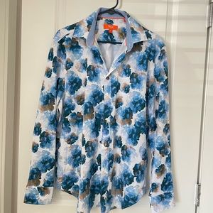 90% cotton. 10% spandex. Tallia sport dress shirt.